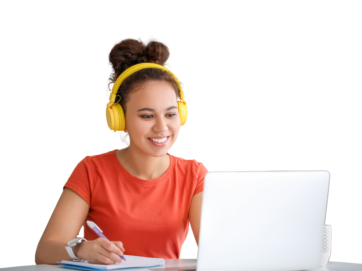 Student studying with headphones and laptop
